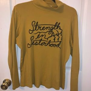 DAZEY LA STRENGTH IN SISTERHOOD TURTLENEK SIZE M/L